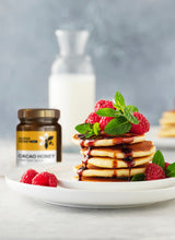 Load image into Gallery viewer, Raw Honey Infused with Cacao 10 oz (285 g)